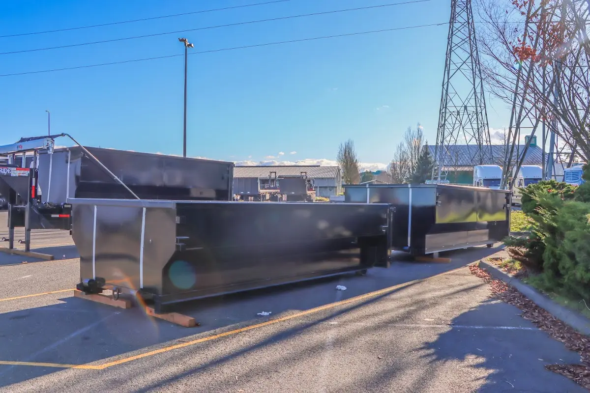 Roll-off dumpster ready for waste disposal at job site for Residential Dumpster Rental in Vermillion